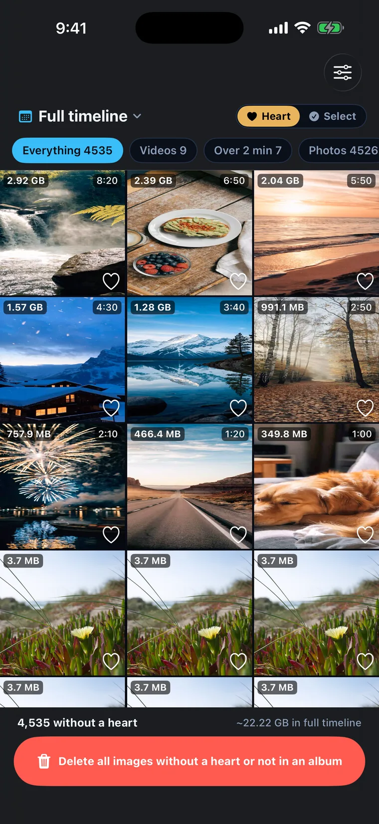 ClearSpace's full timeline: a grid sorted biggest first, the top row tagged 2.92 GB, 2.39 GB and 2.04 GB with video durations, a filter row reading Everything 4535 / Videos 9 / Over 2 min 7 / Photos 4526, and a bottom bar reading '4,535 without a heart — ~22.22 GB in full timeline'.